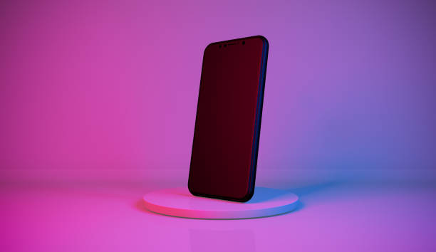 istock Colorful Mobile phone setting on pedestal with blank empty space 1281297102