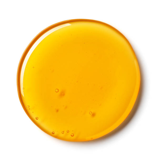 istock Honey isolated on white background, from above 1281298066