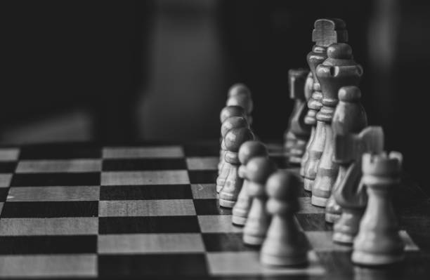 istock Wooden chess on the chessboard 1281299055