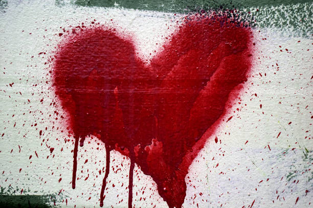 istock Graffiti heart spray-painted on concrete. 1281302914