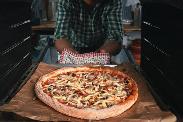 istock Pizza with Prosciutto Ham and Mushrooms 1281304680