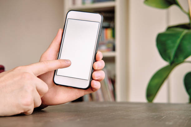 istock Woman using smart phone. Human hand and smart phone close-up shooting. 1281305074