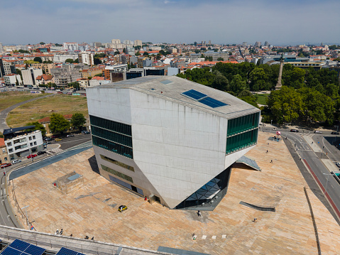 Porto, Portugal 25/6/2020: Casa da Música or Music House is a concert hall designed by Dutch architect Rem Koolhaas for the Porto European Capital of Culture event in 2001, but its construction was only completed in 2005. The large auditorium has a capacity of 1238 seats and the small auditorium does not have a fixed number of seats, but ranges from 300 seats to 650 seats. At the top of the building there is another place for shows.