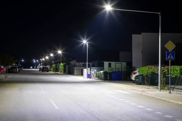 istock quiet night street with modern LED streetlights 1281307391