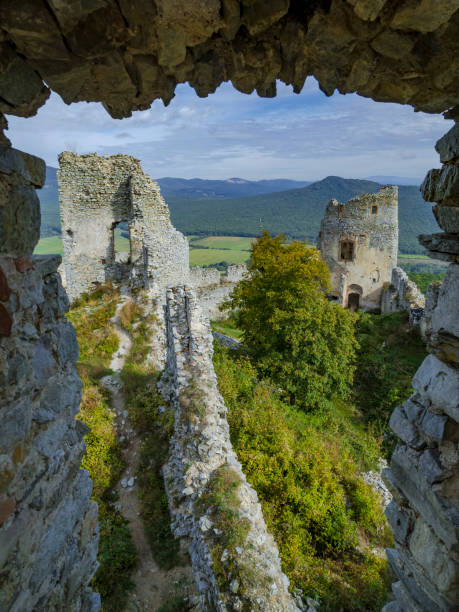 istock Gymes castle walls and towers from window view 1281311485