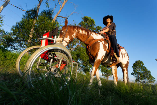 istock Woman sitting on her horse 1281312273
