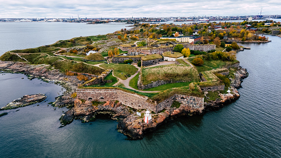This image shows aerial view of Suomenlinna fortress in Helsinki, Finland. The image is taken in daytime in october 2020.