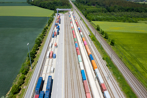 Large group of cargo containers and freight trains, aerial view, Germany, Europe.