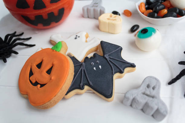 istock Halloween treats on white wooden table 1281319128