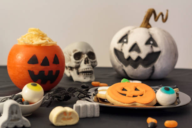 istock Festive table with halloween food and decoration 1281319146