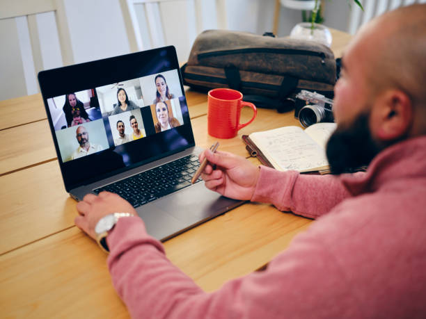 istock Japanese American Man Attending a Web Meeting 1281320905