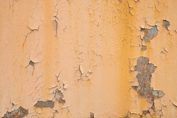 istock Old rusty orange plaque for the background, rust damages old plaque wall, old rusty orange old plaque and corrosion over a wide area of steel plate surface. 1281321803