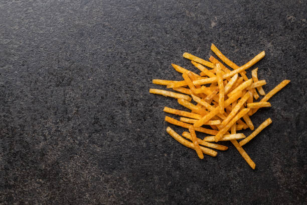 istock French fries. Fried mini potato sticks. 1281322951
