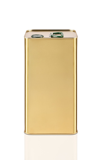 Gold colored oil tin can on the white background