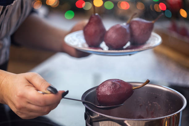 Two ripe pears lie in a towel on the table