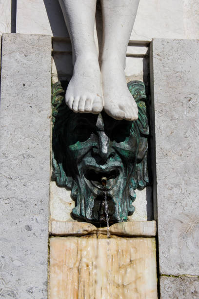 istock Statue stepping on fountaing 1281325124