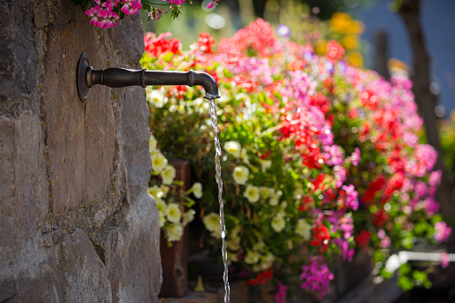 fountain in a typical village in the Hautes Alpes, France.