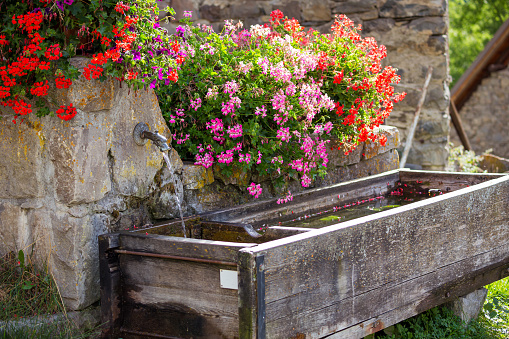 fountain in a typical village in the Hautes Alpes, France.