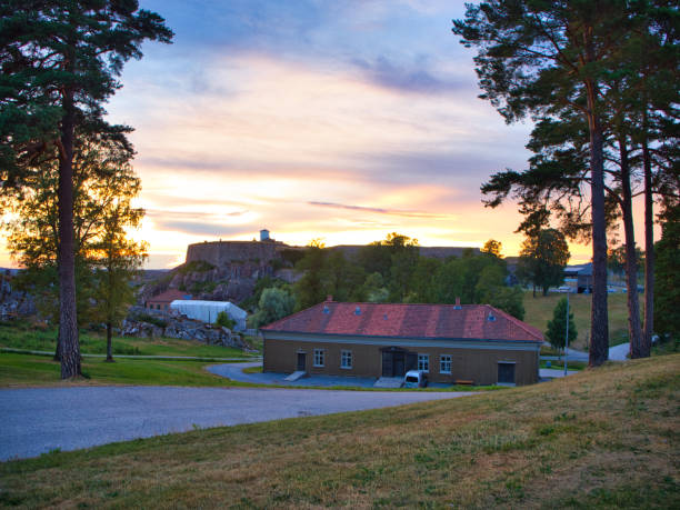 Building on Halden fortess area A small historic building. Halden fortess in the background. Sunset. halden norway photos stock pictures, royalty-free photos & images
