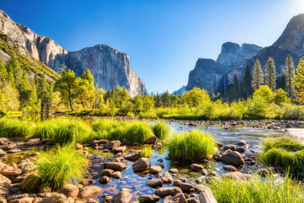 istock Illuminated Yosemite Valley with Reflection at Sunset, Yosemite National Park, California 1281330793