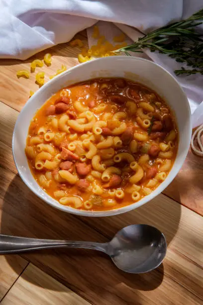 Traditional Italian peasant bean soup pasta e fagioli with gluten-free elbow macaroni noodles