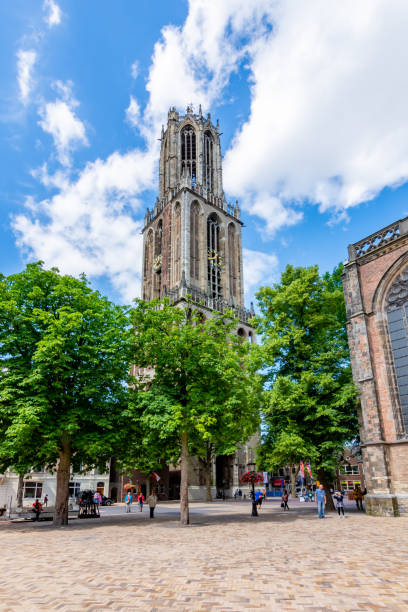 Utrecht, Netherlands- 02 MAY, 2018: Ancient Tower of the St. Martins Cathedral at sunny day. The Dom Tower is the tallest church tower of The Netherlands.