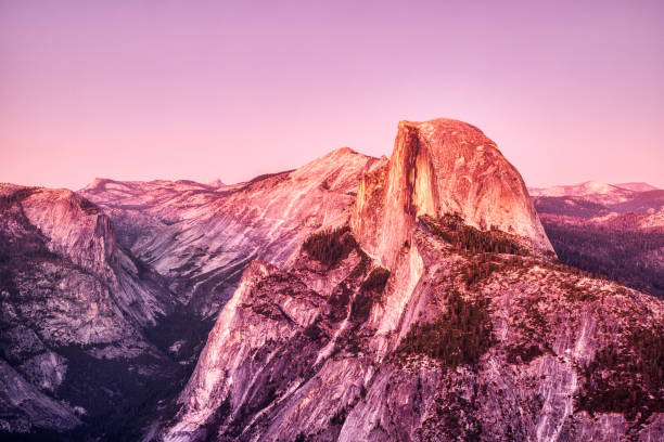 istock Yosemite Valley with Illuminated Half Dome at Sunset, View from Glacier Point, Yosemite National Park, California 1281331367
