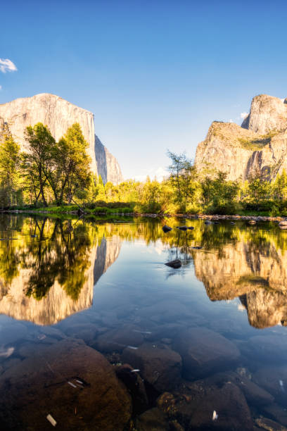 istock Illuminated Yosemite Valley with Reflection at Sunset, Yosemite National Park, California 1281331567