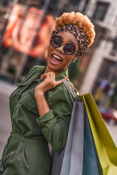 istock Pretty Afro American lady screaming while standing in the city 1281338763