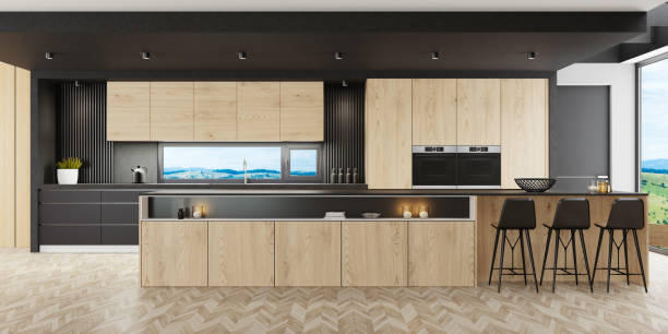 istock Luxurious matte black minimalist kitchen interior with long island table and wooden cabinets 1281340211