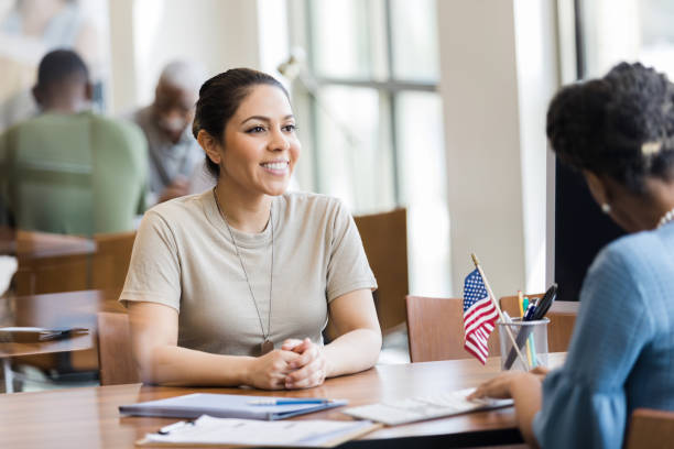 istock Female veteran talking with bank manager 1281341028