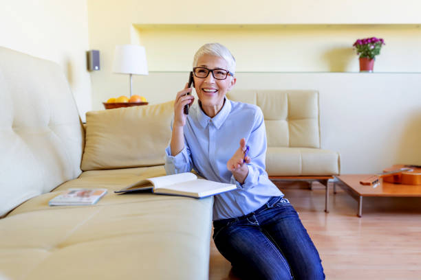 istock Mature businesswoman working from home 1281343103