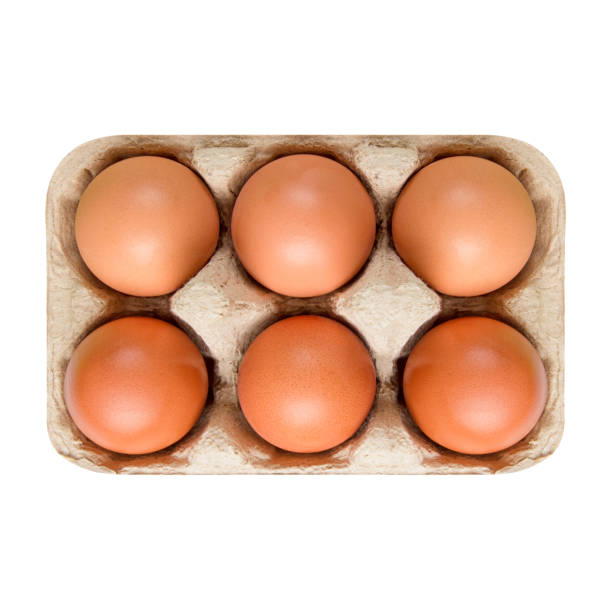 istock Packing, box of brown, beige eggs isolated on white background. top view, 6 pieces. 1281347791