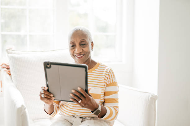 istock Online banking for seniors 1281355425