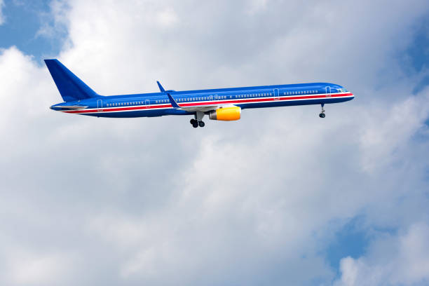 istock A big blue jet taking off in blue cloudy sky. 1281361876