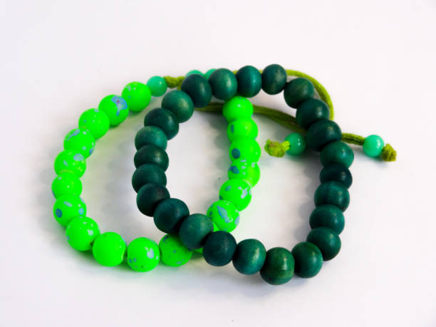 istock bracelet in green on white background 1281366905