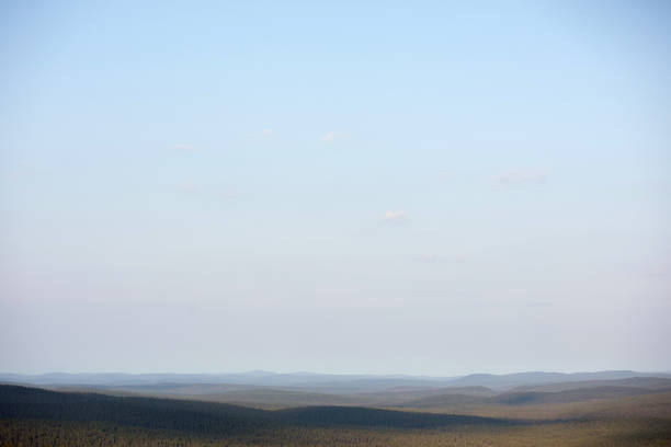 Beautifull distant landscape over the hills and mountains under a big sky in Finnish Lapland