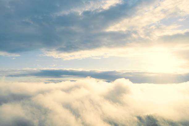 istock Aerial view white clouds in blue sky. View from drone. Aerial view cloudscape texture background. Texture of clouds. View from above. Panorama clouds background 1281389520