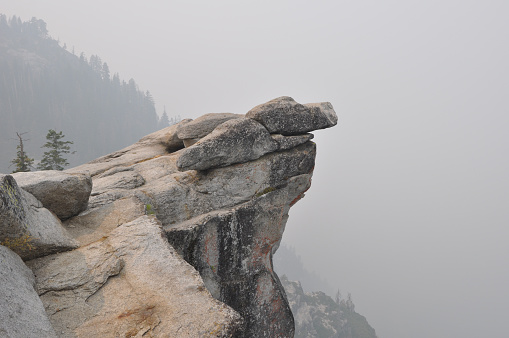 Extremely hazy and smokey view from Glacier Point lookout at Yosemite National Park, during wildfire season