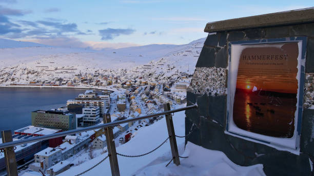 aerial view over harbor and downtown from platform in winter with a sign that informs about the fact that hammerfest is the northernmost located city worldwide. - hammerfest imagens e fotografias de stock