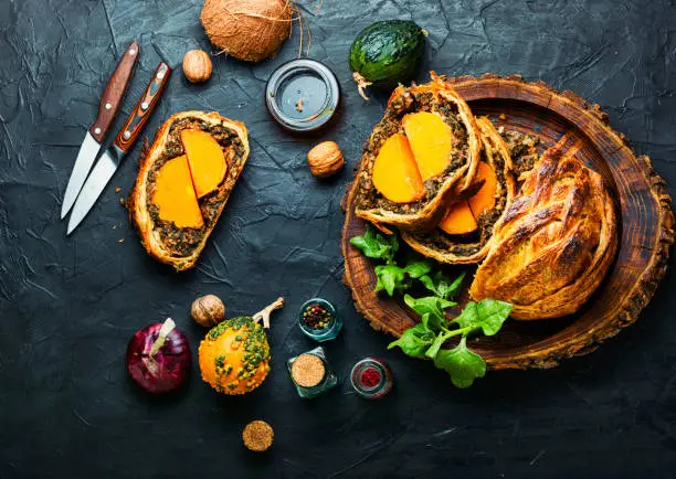 Wellington pumpkin,loaf of bread stuffed with baked mushrooms and pumpkin.