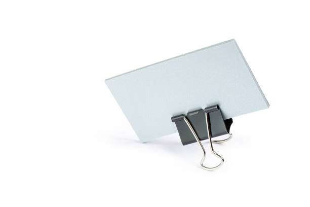 Business cards on a paper clip, isolate