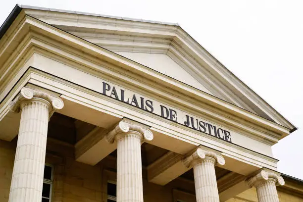 palais de justice text on ancient building means in french courthouse justice court