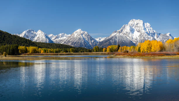 istock Reflection of snowcapped Mount Moran over Snake River. 1281396020