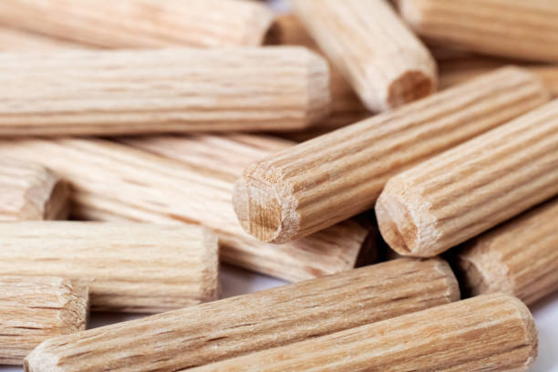 istock Wooden dowels in a heap close up 1281396892