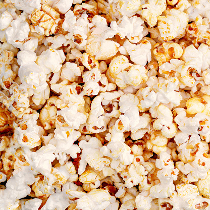 Homemade Kettle Corn Popcorn on black background with copy space. Top view\