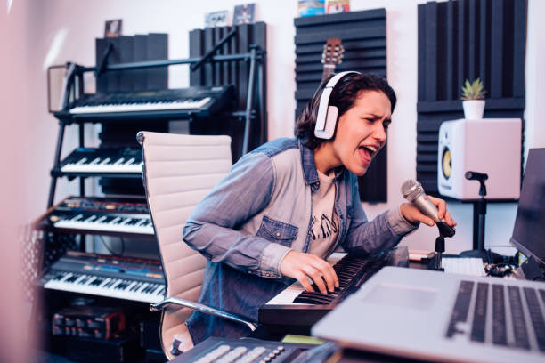 istock Musician having a recording session at her studio 1281397816