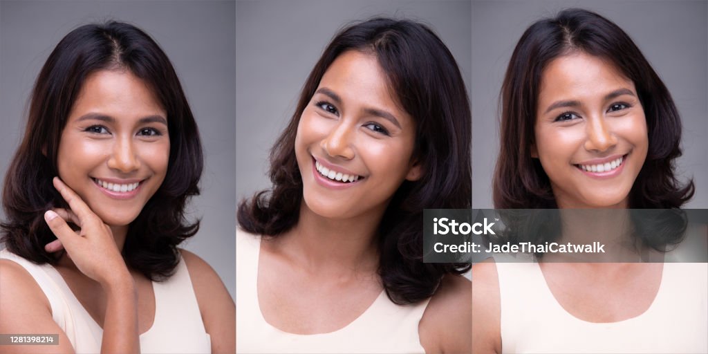 Fashion Portrait Profile Asian Woman fashionable item make up Portrait of Fashion 20s Asian Woman has beautiful face, she wear white shirt, smile happy feeling with white teeth over gray Background isolated 20-29 Years Stock Photo