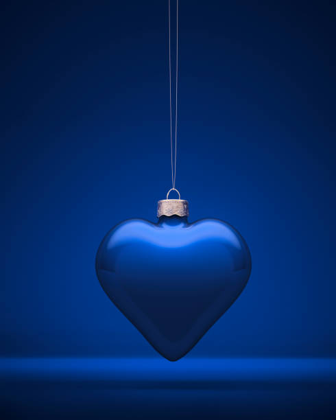 Glossy royal blue glass heart shape.