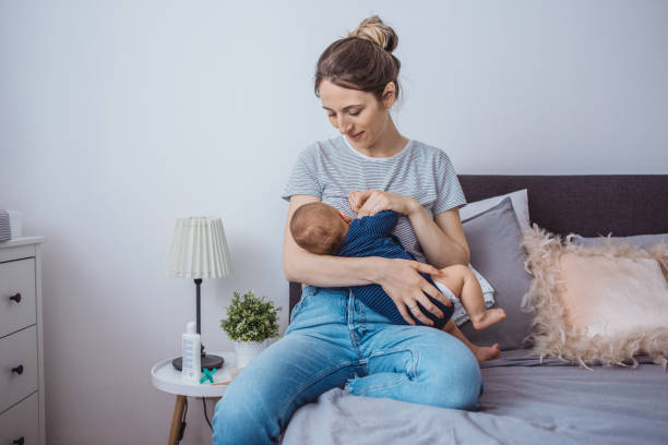 istock Mother breastfeeding baby 1281400523